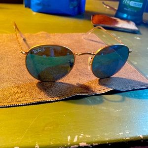 Selling 1 year old Ray Ban Round Flash sunglasses
